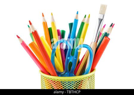 Colored pencils and various colorful stationery for school in a metal holder or cup. Isolated on white. Stock Photo