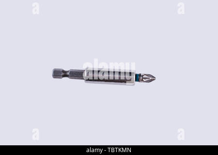 Screwdriver bit holder isolated on white background. Metal tool with copy space. Stock Photo