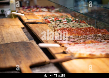 Roman style pizza in pala , high idration , sell by the slice in a