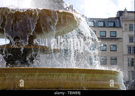 Fountain at Trafalgar square in London. Stock Photo