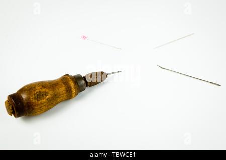 Sharp tailor's tools, spiky instrument for hand made tailoring in diagonal shape Stock Photo