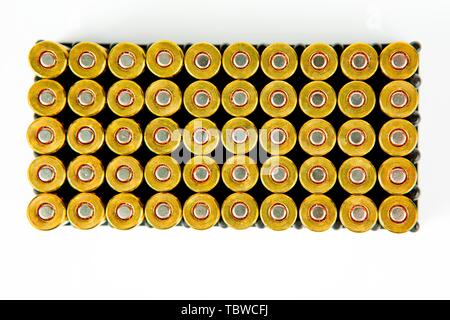 Box of 50 pieces of 9 mm pistol ammunition, small plastic container, top view Stock Photo