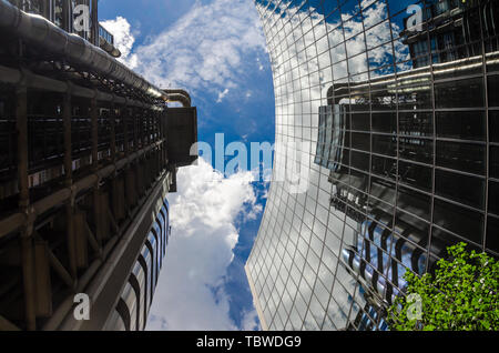 Looking up at the Willis Building and Lloyds of London Building in the Financial District of The City of London