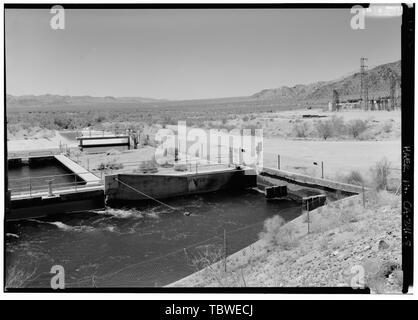 MAIN INLET FROM FILTER GALLERY AND CANAL INTO HINDS PLANT. VIEW LOOKING DUE WEST OF HINDS COMPLEX IN BACKGROUND OF SAND FILTERS.  Hinds Pump Plant, East of Joshua Tree National Monument, 5 miles north of Route 10, Hayfield, Riverside County, CA Stock Photo