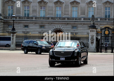 The motorcade of US President Donald Trump makes its way from Buckingham Palace to Westminster Abbey, London, during the first day of his state visit to the UK. Stock Photo