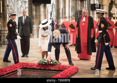 US President Donald Trump, accompanied by his wife Melania and the Duke of York, places a wreath on the Grave of the Unknown Warrior during a tour of Westminster Abbey in central London, on day one of his state visit to the UK. Stock Photo