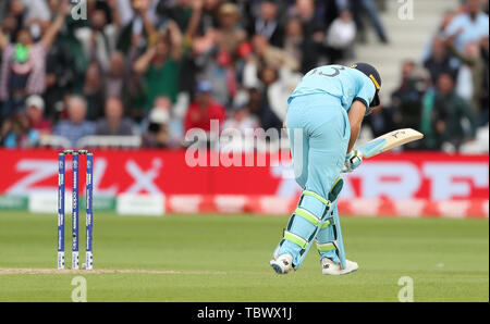 England's Jos Buttler reacts as he is caught by Pakistan's Wahab Riaz for 103 during the ICC cricket World Cup group stage match at Trent Bridge, Nottingham. Stock Photo