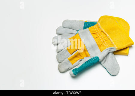 Working mens gloves isolated on white background Stock Photo