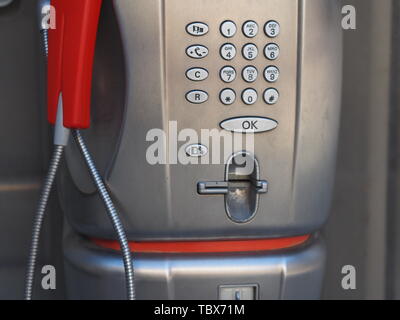 Milan, Italy - May 31, 2019: closeup photo of a Telecom Italian public telephone in Milan Stock Photo