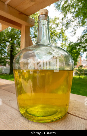 Glass Bottle Filled With Yellow Juice Stock Photo Alamy