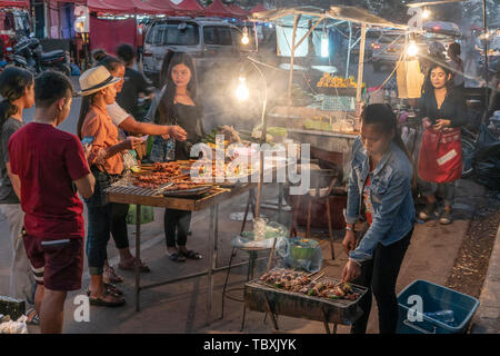Food stall on main street in Vientiane, night market, Laos Stock Photo