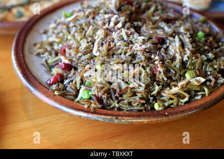 A plate of Wild Rice served in a Grand Marais restaurant.Minnesota.USA Stock Photo