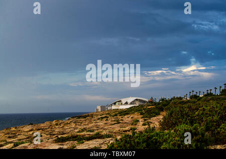 Buggiba, Malta 30. may 2019 - Malta National Aquarium on rainy day with dramatic dark sky and clouds Stock Photo