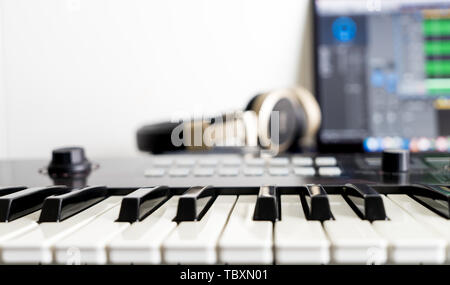 Music Keyboard in DAW home studio music station Stock Photo