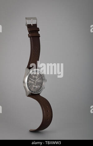 Hugo Boss designer watch photographed with a grey background. Stock Photo