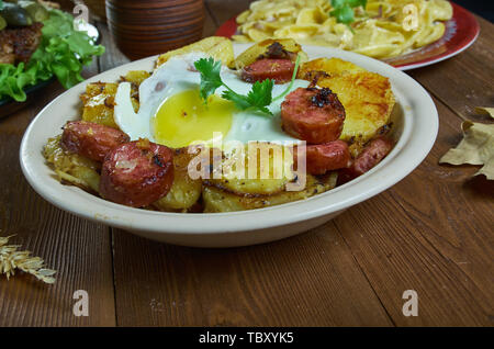 Tiroler gröstl. Potato, bacon and onion hash. Austria Food Stock Photo ...