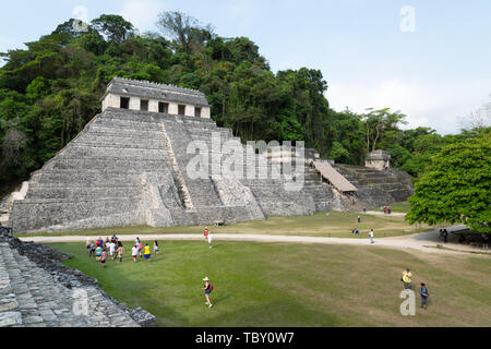 Palenque Mexico - people looking at the Temple of the Inscriptions, a mayan pyramid at the UNESCO mayan ruins, Palenque, Mexico Central America Stock Photo