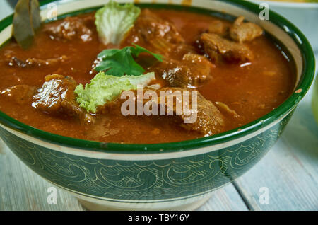 Kolhapuri tambda rassa, Red Mutton Curry,  Maharashtrian national  cuisine, Traditional assorted Asia dishes, Top view. Stock Photo