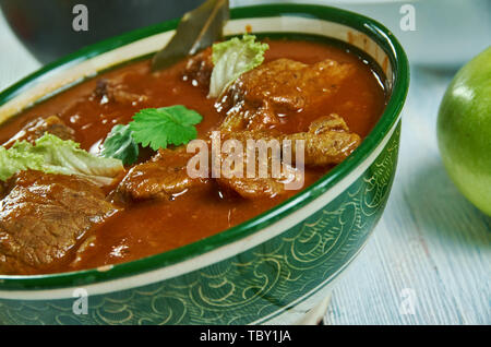 Kolhapuri tambda rassa, Red Mutton Curry,  Maharashtrian national  cuisine, Traditional assorted Asia dishes, Top view. Stock Photo