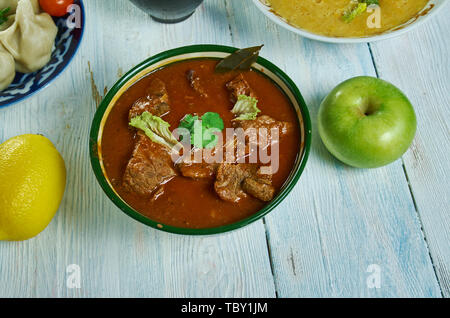 Kolhapuri tambda rassa, Red Mutton Curry,  Maharashtrian national  cuisine, Traditional assorted Asia dishes, Top view. Stock Photo