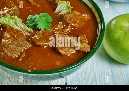 Kolhapuri tambda rassa, Red Mutton Curry,  Maharashtrian national  cuisine, Traditional assorted Asia dishes, Top view. Stock Photo