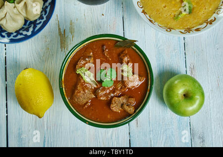 Kolhapuri tambda rassa, Red Mutton Curry,  Maharashtrian national  cuisine, Traditional assorted Asia dishes, Top view. Stock Photo