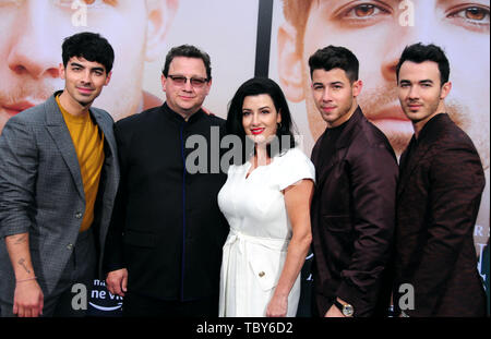 Los Angeles, California, USA 3rd June 2019 Singer Joe Jonas, father Paul Kevin Jonas Sr., mother Denise Miller Jonas, singer Nick Jonas and singer Kevin Jonas of The Jonas Brothers attend the World Premiere of Jonas Brothers Chasing Happiness on June 3, 2019 at Regency Bruin Theater in Los Angeles, California, USA. Photo by Barry King/Alamy Live News Stock Photo