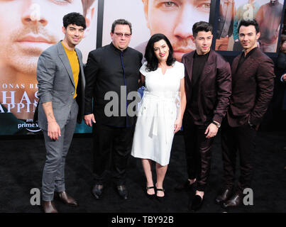 Los Angeles, California, USA 3rd June 2019 Singer Joe Jonas, father Paul Kevin Jonas Sr., mother Denise Miller Jonas, singer Nick Jonas and singer Kevin Jonas of The Jonas Brothers attend the World Premiere of Jonas Brothers Chasing Happiness on June 3, 2019 at Regency Bruin Theater in Los Angeles, California, USA. Photo by Barry King/Alamy Live News Stock Photo