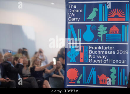 Frankfurt Am Maimn, Germany. 04th June, 2019. 'The dream we carry' - the motto of the book fair host country Norway - can be read on a poster during a press conference in the Museum of Applied Arts. Here the organizers presented the concept for the presentation at the fair. Norway is this year's Guest of Honour at the Frankfurt Book Fair. Credit: Boris Roessler/dpa/Alamy Live News Stock Photo