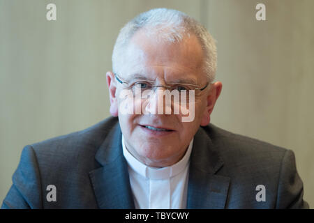 Dresden, Germany. 04th June, 2019. Heinrich Timmerevers, Roman Catholic bishop, speaks at a discussion with church representatives at the regional church office. At the meeting bishops of the Protestant and Catholic Church in Saxony want to talk about social challenges. It is about social cohesion, the responsibility of the individual and the role of the churches as mediators. Credit: Sebastian Kahnert/dpa-Zentralbild/dpa/Alamy Live News Stock Photo