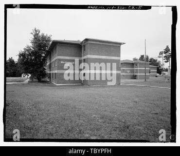 NORTH (SIDE) AND EAST (REAR) ELEVATIONS OF BUILDING. VIEW TO SOUTH.  Plattsburgh Air Force Base, Airmen Dormitory, New York Road, Plattsburgh, Clinton County, NY Stock Photo