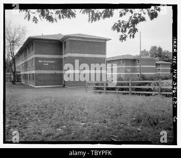 NORTH (SIDE) AND EAST (REAR) ELEVATIONS OF BUILDING. VIEW TO SOUTH.  Plattsburgh Air Force Base, Airmen Dormitory, New York Road, Plattsburgh, Clinton County, NY Stock Photo