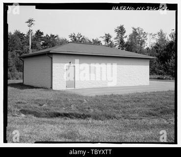 North (rear) and west (side) elevations of building. View to southeast.  Plattsburgh Air Force Base, Utility Vault, Idaho at Alabama Avenue, Plattsburgh, Clinton County, NY Stock Photo