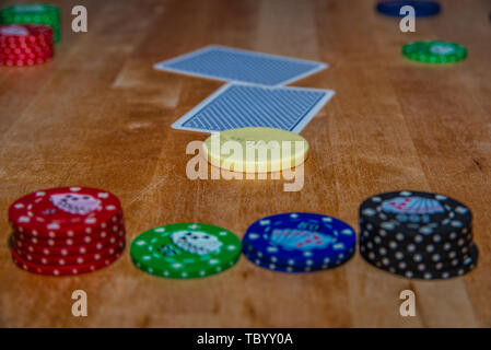 Poker chips and cards for Texas hold'em Stock Photo