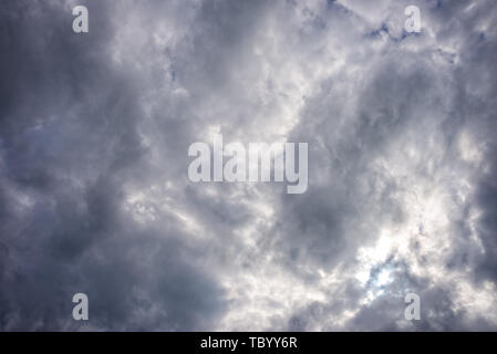Thick and dangerous storm clouds in the sky Stock Photo