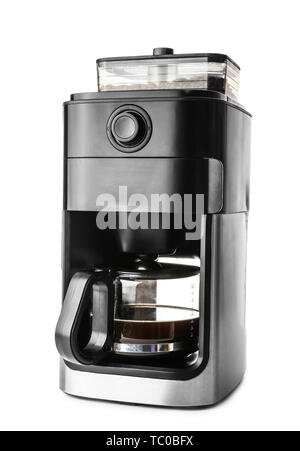 Modern coffee machine on white 