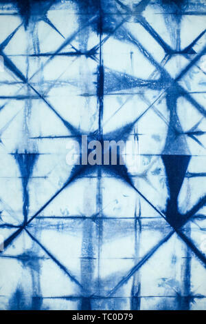 Batik braid glowing dots abstract background Stock Photo