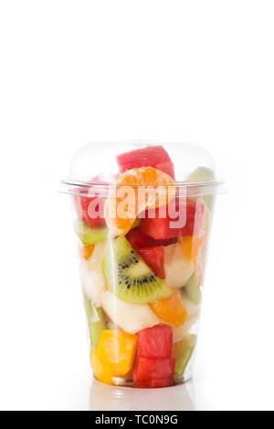 Fresh cut fruit in a plastic cup isolated on white background Stock Photo