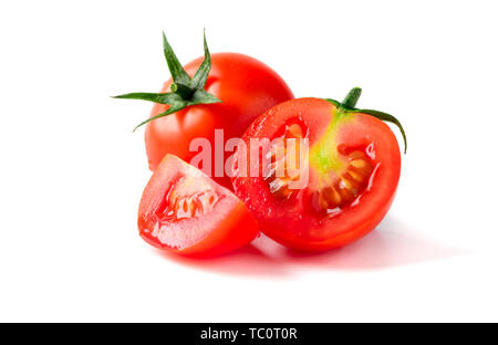 Fresh Sliced Tomatoes isolated on white. Tomato with drops, Healthy vegetable concept Stock Photo