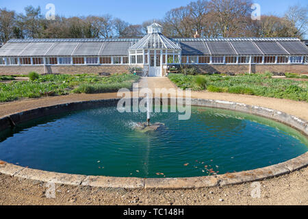 Garden designed by Piet Oudolf at Scampston Hall, Yorkshire, England, UK - Perennial Meadow pond and Pavilion Stock Photo