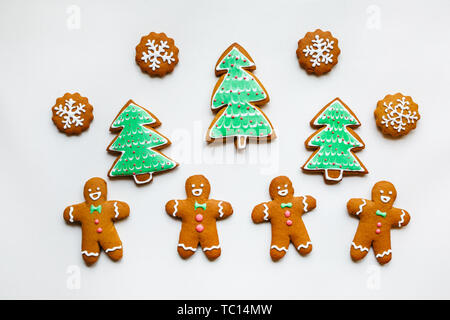Handmade festive gingerbread cookies in the form of stars, snowflakes, people, socks, staff, mittens, Christmas trees, hearts for xmas and new year ho Stock Photo