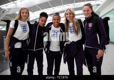 England's Leah Williamson (left to right), Demi Stokes, Nikita Parris, Toni Duggan and Abbie McManus at Heathrow Airport in London, as the England Women's team depart for the Women's World Cup in France. Stock Photo