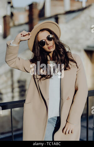 Fashion Blogger Outfit Details Fashionable Woman Wearing Beige Trench Coat  Stock Photo by ©mlasaimages 202970266