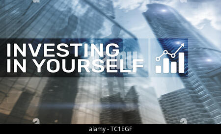 Invest in yourself. Personal development and education concept on abstract blurred background. Stock Photo
