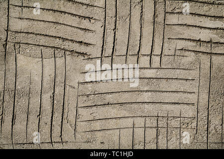 Grunge cracked gray plaster surface texture Stock Photo