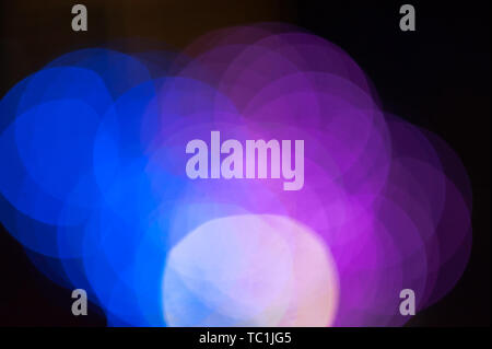 Blue, purple, green, black aperture halo Stock Photo