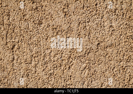 Yellow grunge rough wall surface texture Stock Photo