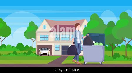 man putting two garbage bags in trash bin young guy doing housework cleaning service concept modern village house exterior full length flat landscape Stock Vector