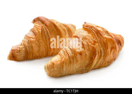 Two baked plain croissants isolated on white. Stock Photo