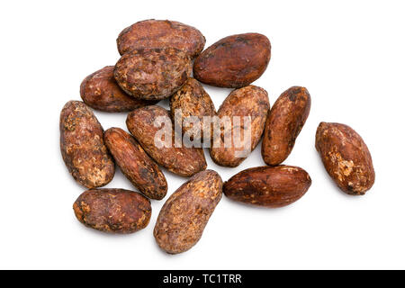 Group of roasted unpeeled cocoa beans isolated on white from above. Stock Photo